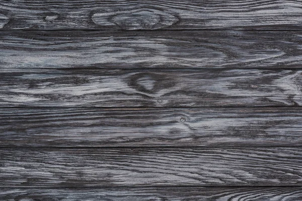 Vista de primer plano del fondo de madera oscura con tablones horizontales - foto de stock