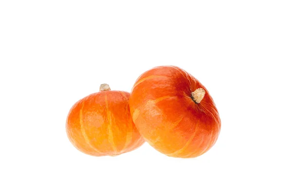 Dos calabazas otoñales naranjas maduras aisladas en blanco - foto de stock