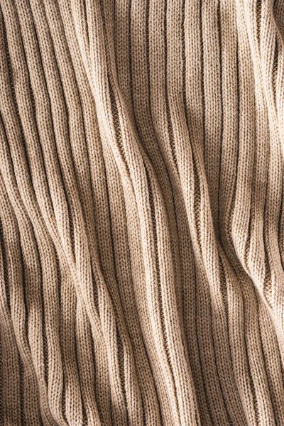 Plein cadre de toile de laine pliée beige fond — Photo de stock