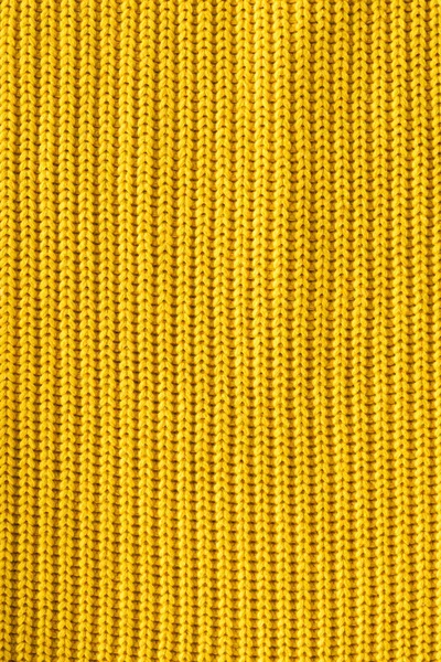Close up view of bright yellow woolen fabric as backdrop — Stock Photo