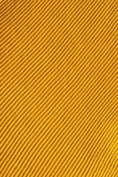 Full frame of yellow woolen fabric backdrop — Stock Photo