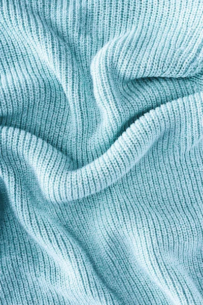 Крупним планом вид складеної синьої вовняної тканини як фон — стокове фото