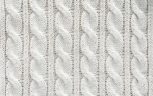 Plein cadre de tissu tricoté blanc avec motif comme fond — Photo de stock