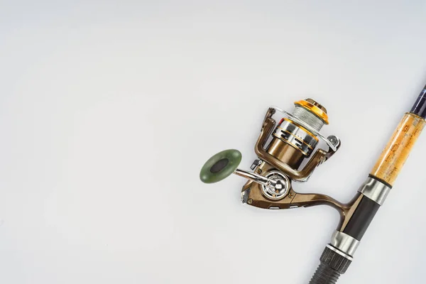 Top view of fishing rod isolated on white, minimalistic concept — Stock Photo