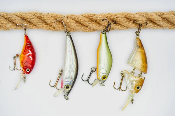 View from above of nautical rope and fishing bait isolated on white — Stock Photo