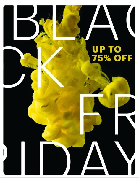 Bright yellow flowing paint explosion on black background with black friday sale — Stock Photo