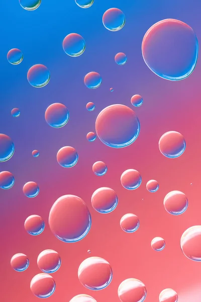 Beautiful calm transparent water drops on bright abstract background — Stock Photo