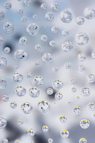 Vista close-up de belas gotas de chuva transparentes sobre fundo abstrato borrado — Fotografia de Stock