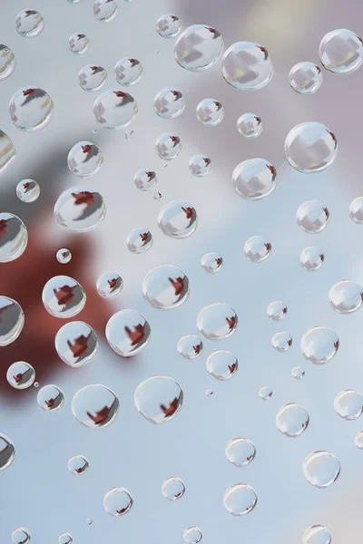 Vista de cerca de gotas de lluvia transparentes sobre fondo abstracto borroso - foto de stock