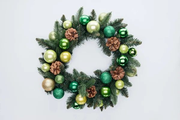 Top view of decorative festive wreath with green christmas toys isolated on white — Stock Photo