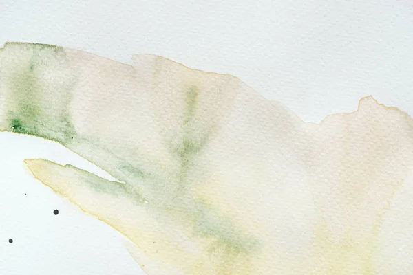 Абстрактная зеленая и желтая акварель на белом фоне — стоковое фото