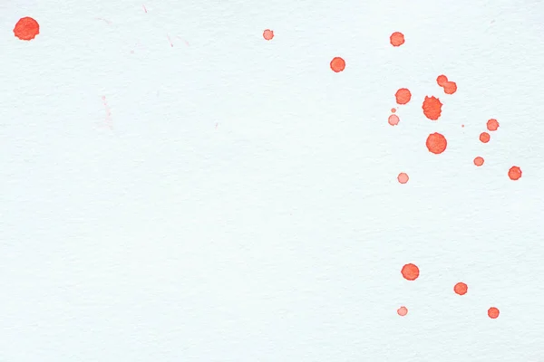 Abstract red watercolor drops on white paper background with copy space — Stock Photo