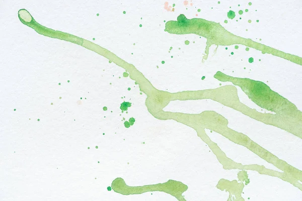 Abstrakte grüne Aquarellflecken auf weißem Papier — Stockfoto