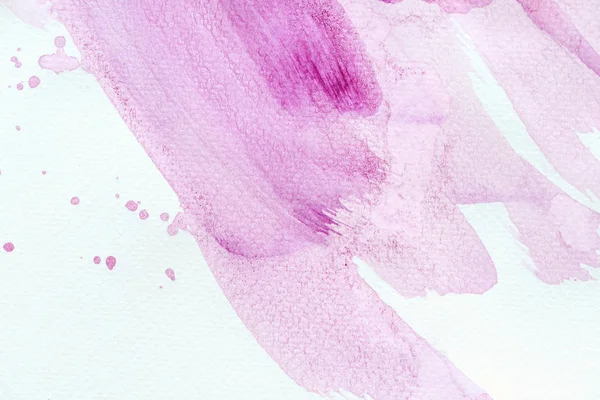 Abstract violet watercolor strokes with splatters on white paper — Stock Photo