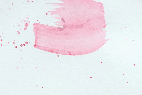 Fondo abstracto con trazos de acuarela de color rosa claro y salpicaduras — Stock Photo