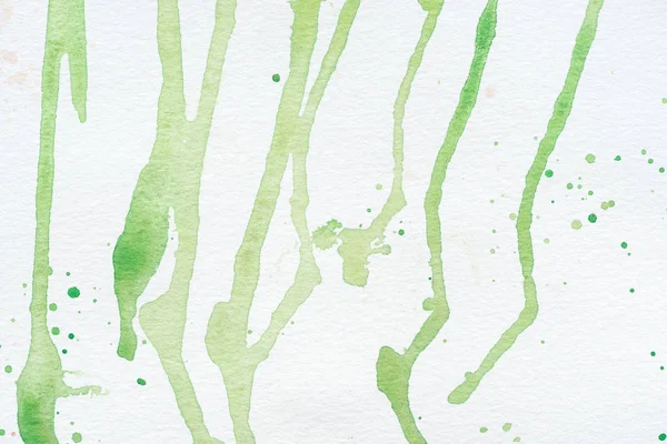 Manchas aquarela verde abstrata no papel branco — Fotografia de Stock