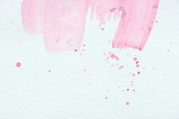 Textura abstrata com traços e respingos de aquarela rosa — Fotografia de Stock