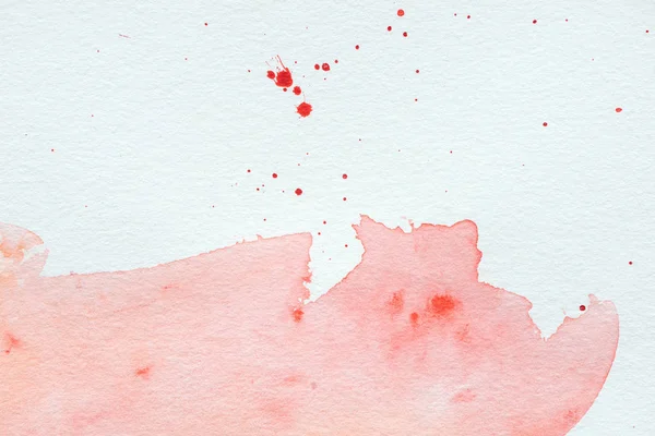 Peinture abstraite aquarelle rouge sur papier blanc — Photo de stock