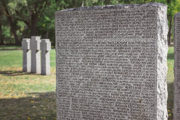 Close up view of memorial tombstone with lettering at graveyard — Stock Photo