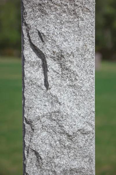 Close up shot of stone memorial monument at cemetery — Stock Photo
