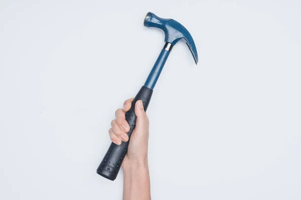 Cropped shot of woman holding hammer isolated on white — Stock Photo