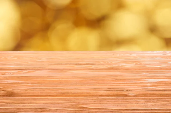 Template of orange wooden floor with blurred orange background — Stock Photo