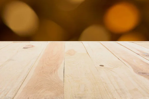 Template of beige wooden floor made of planks on blurred orange background — Stock Photo