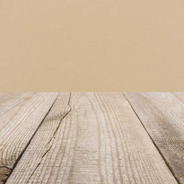 Surface de planches en bois beige avec un fond beige foncé — Photo de stock