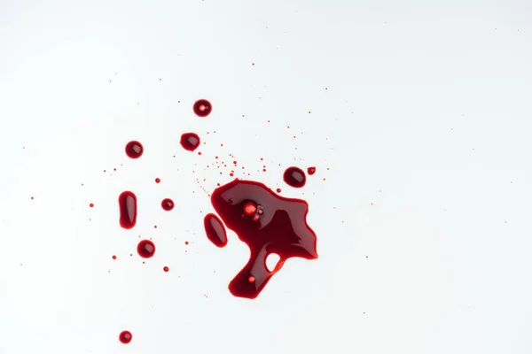 Top view of white tabletop with blood blots — Stock Photo