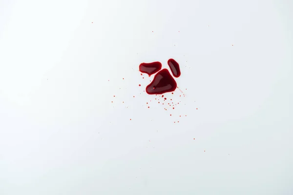 Vista dall'alto della superficie bianca con gocce di sangue — Foto stock