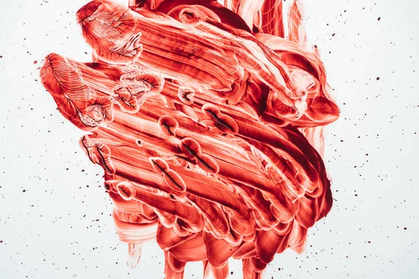 Top view of blood smeared with hand on white — Stock Photo