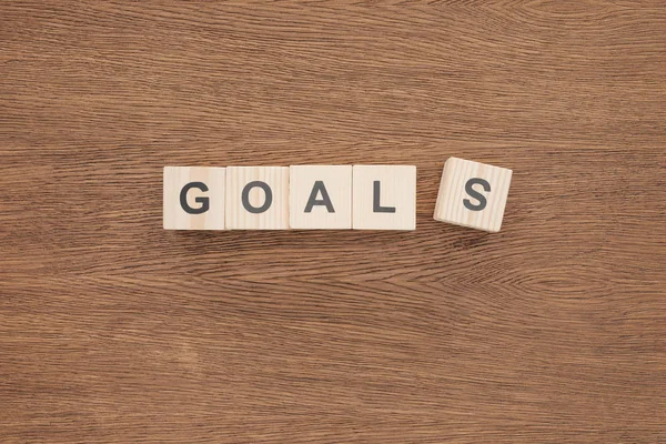 'goals' word made of wooden blocks on wooden tabletop, goal setting concept — Stock Photo