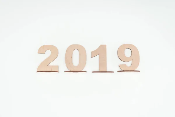 Top view of wooden numbers with 2019 date isolated on white — Stock Photo