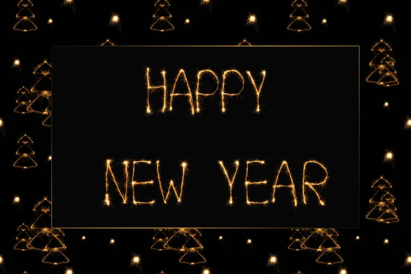 Close up view of happy new year light lettering and fir tree light signs on black backdrop — Stock Photo