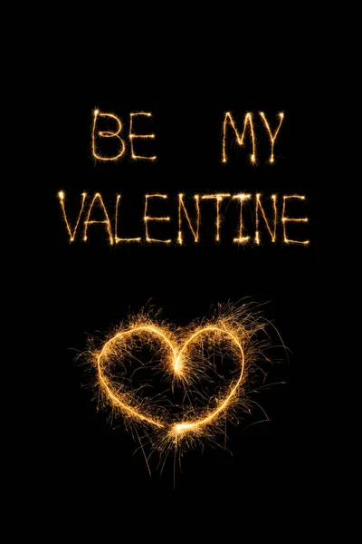 Close up view of be my valentine light lettering and heart on black background, st valentines day concept — Stock Photo