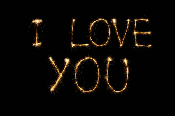 Close up view of i love you light learning on black fone, st valentines day concept — стоковое фото