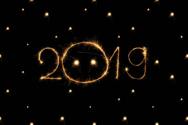 2019 and dots light sings on black background — Stock Photo