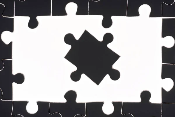 Повна рамка чорно-білих головоломок — стокове фото