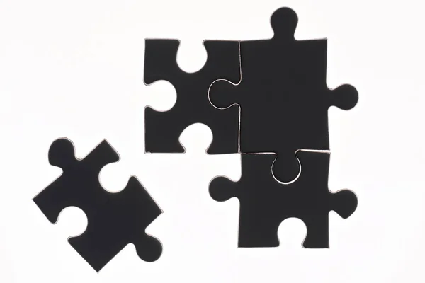 Full frame of black and white puzzles backdrop — Stock Photo
