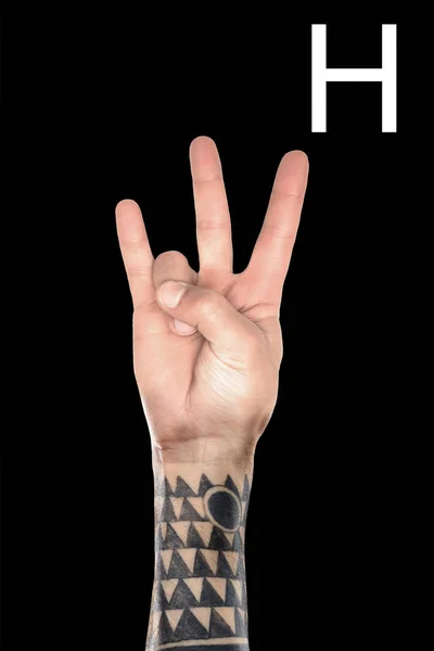 Tätowierte Hand mit kyrillischer Schrift, taubstummer Sprache, isoliert auf schwarz — Stockfoto