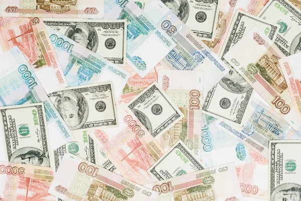 Fond transparent avec des dollars et des billets de banque russes — Photo de stock