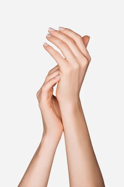 Abgeschnittene Ansicht weiblicher Hände isoliert auf Weiß — Stockfoto