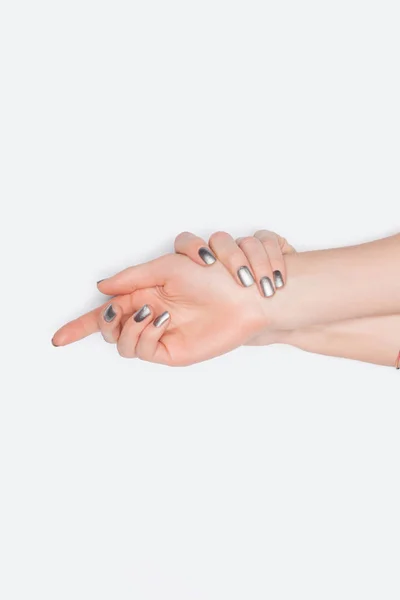 Vue de dessus des mains féminines isolées sur blanc — Photo de stock