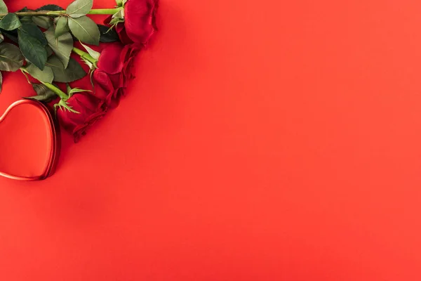 Top view of roses isolated on red with copy space, st valentines day concept — Stock Photo