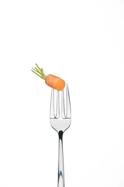 Piece of ripe fresh carrot on fork isolated on white — Stock Photo