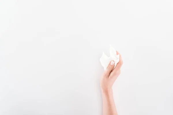 Partial view of woman holding paper on grey background — Stock Photo