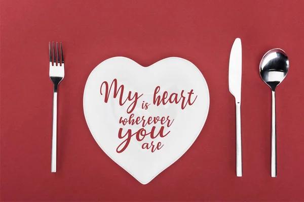 View from above of heart shaped plate with 