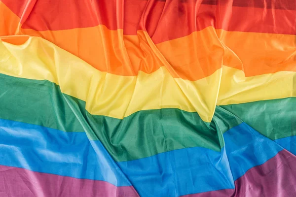 Top view of creased rainbow flag, lgbt concept — Stock Photo