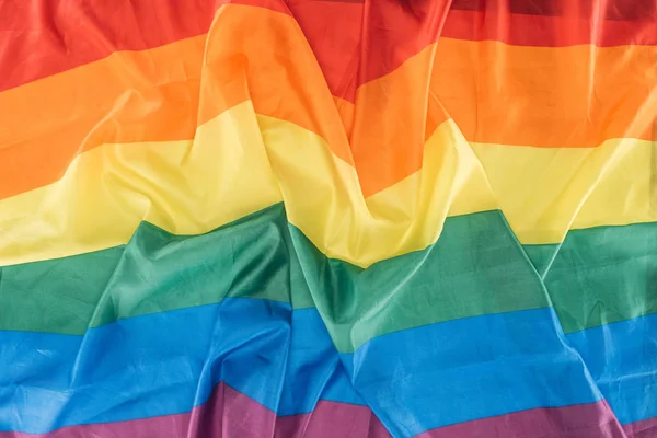 Top view of creased lgbt pride flag, lgbt concept — Stock Photo