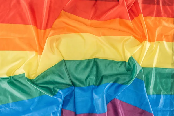 Top view of creased lgbt rainbow flag, lgbt concept — Stock Photo